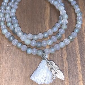 Hand beaded feather and tassel necklace